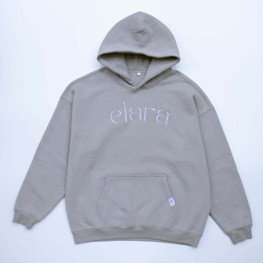 Gray hoodie with Elara embroidered graphic