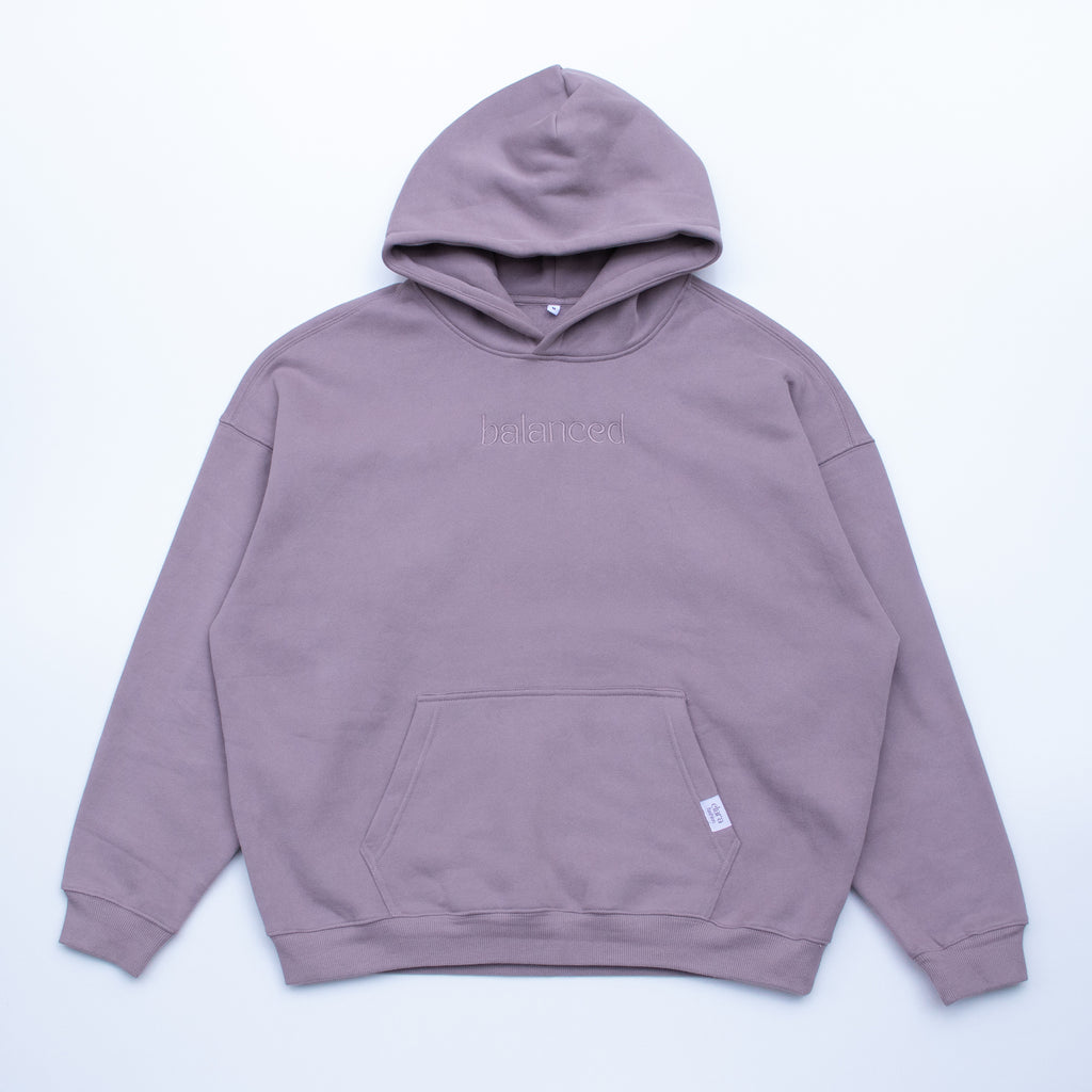 Purple hoodie with Balanced embroidered graphic